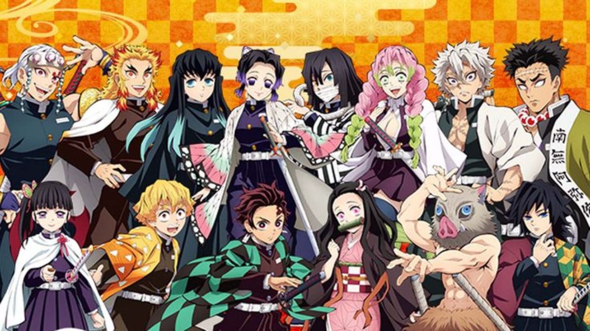 A full group photo of the main Demon Slayer characters, including the Hashira and members of the Kamado family, smiling and posing together.