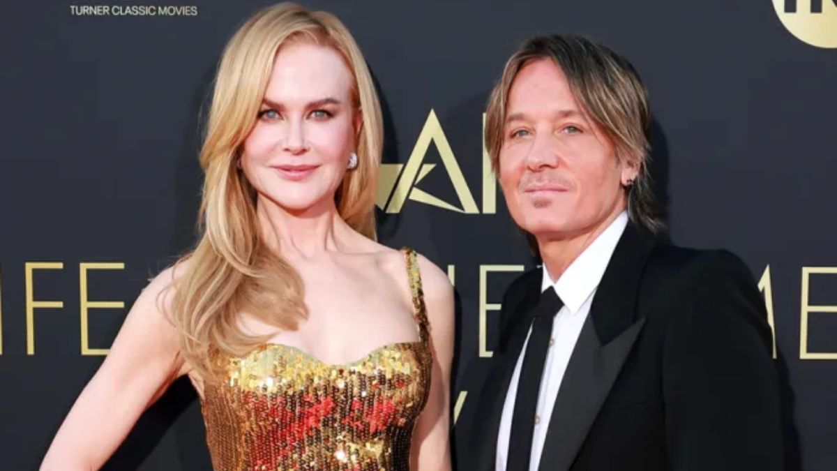 Iconic Hollywood couple Nicole Kidman and Keith Urban smiling together at a red carpet event, prior to their reported split after 19 years of marriage.