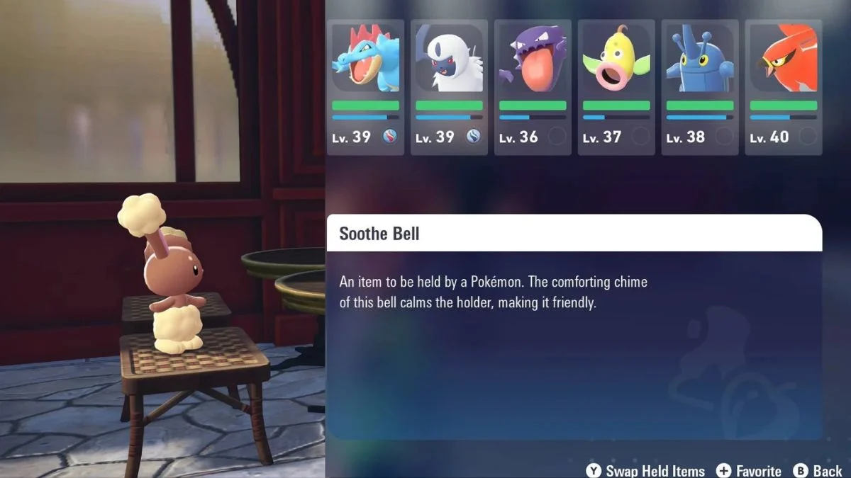 Buneary sitting next to a menu showing the Soothe Bell item description: "An item to be held by a Pokémon. The comforting chime of this bell calms the holder, making it friendly."