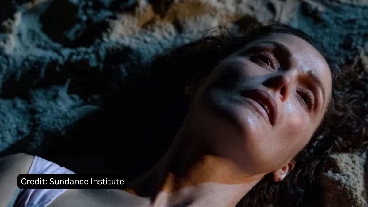 Rose Byrne as Linda, the protagonist, lying on the ground in distress, capturing the emotional and psychological breakdown in the film If I Had Legs I'd Kick You.