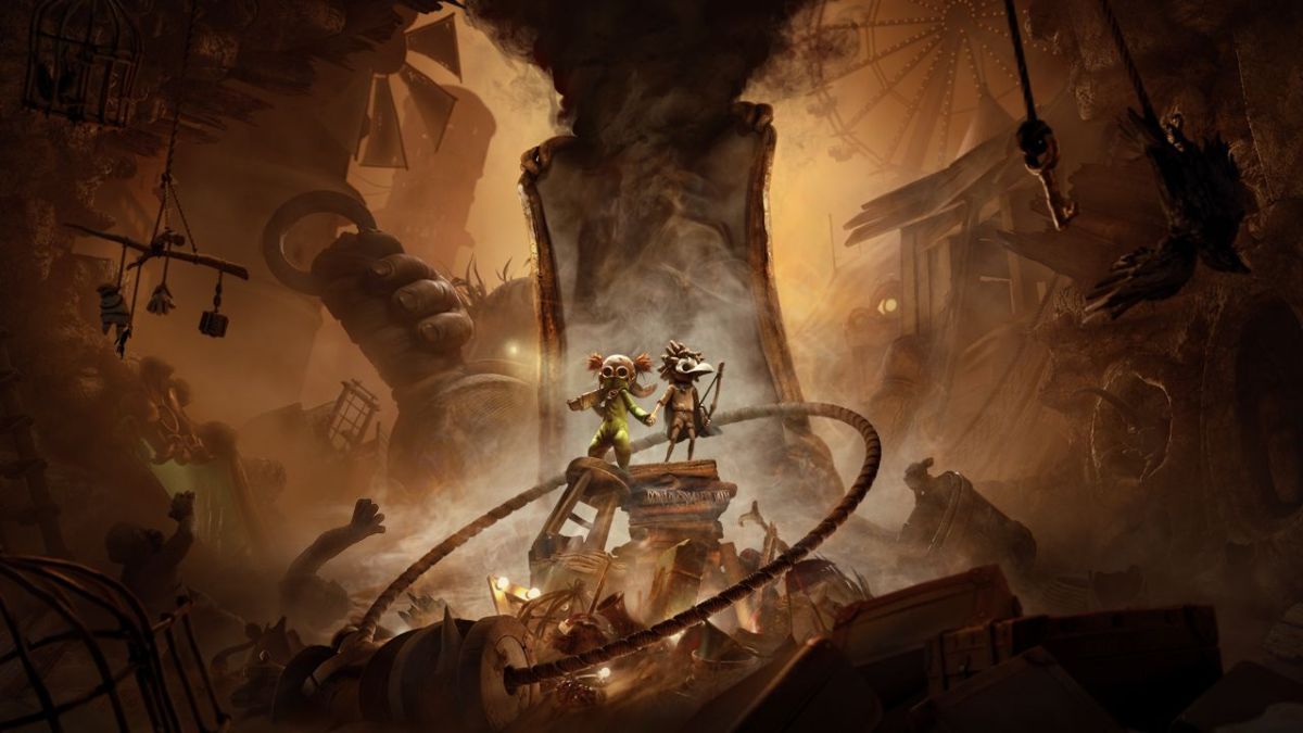 Official key art for Little Nightmares 3, showing the two protagonists, Low and Alone, standing together on debris in a dusty, dark, and twisted carnival-like environment, ready for their online co-op adventure.