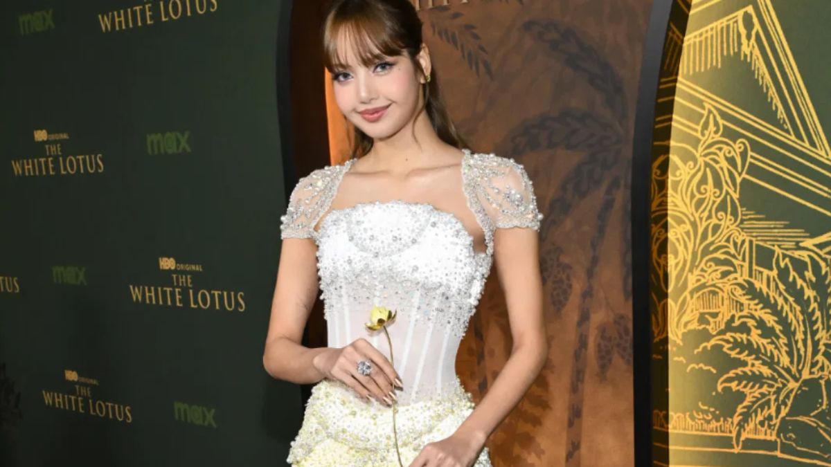 BLACKPINK's Lisa looking fierce, representing her RIAA Gold-certified solo single "ROCKSTAR" and breakthrough U.S. success.