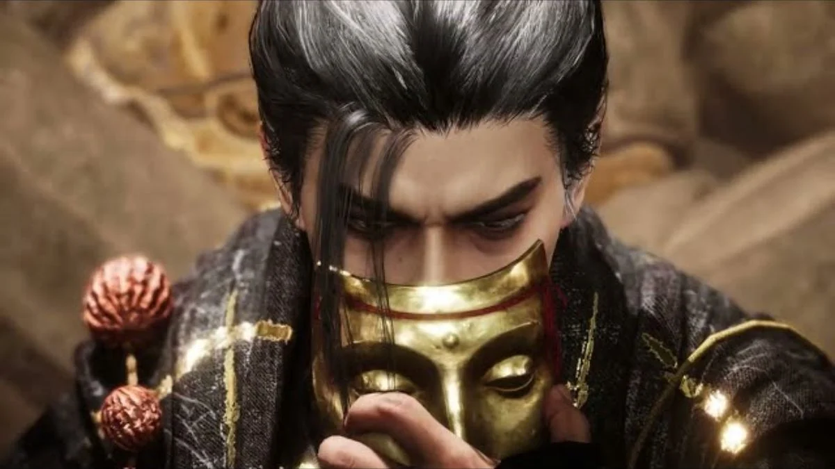 A dramatic, close-up shot of a male character from Where Winds Meet, with black and white hair, holding a golden mask to his face.