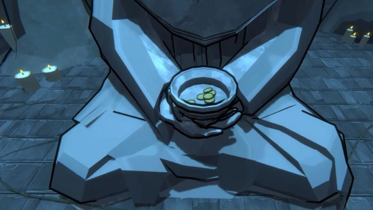 A close-up view of a stone bowl held by the monk statue containing a specific number of gold coins for a blessing.