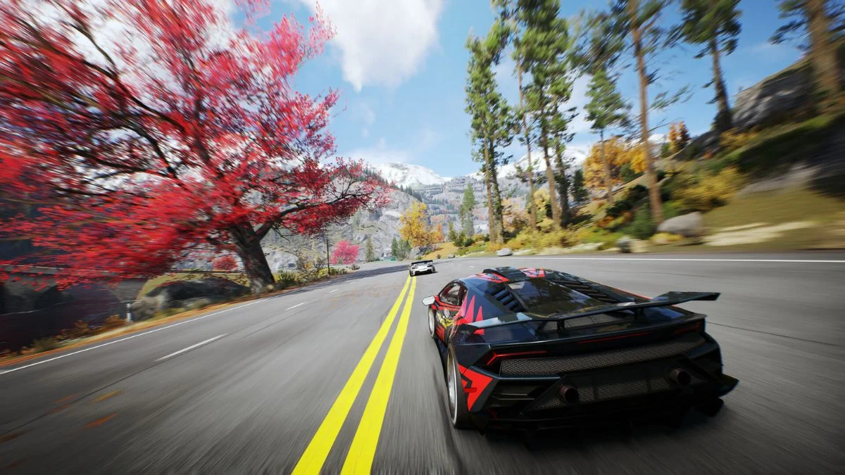 A high-speed racing scene in CarX Street featuring a black and red sports car drifting through a mountain pass.