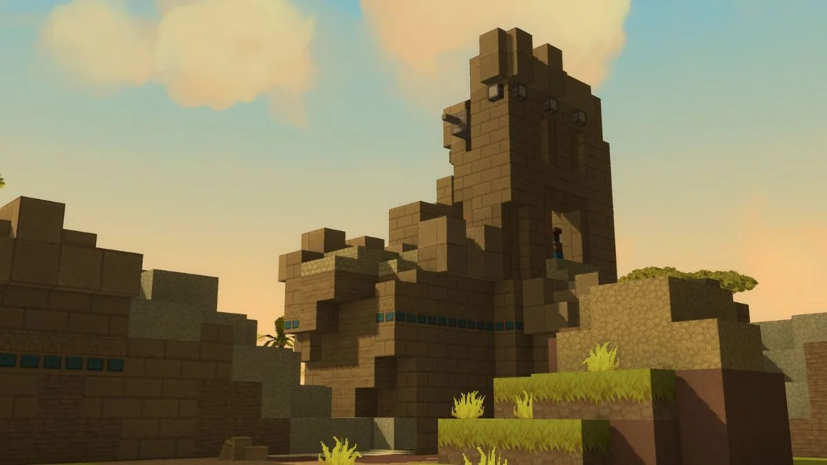 A desert-themed Hytale world featuring a large block-based fortress under a soft sunset sky with voxel clouds.