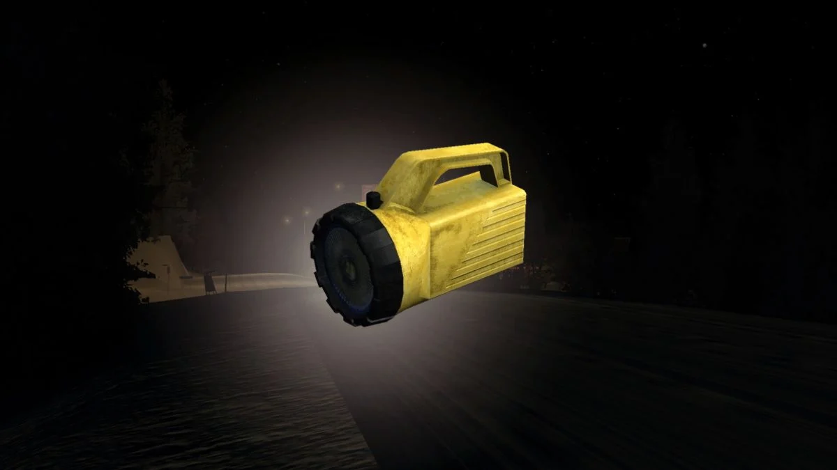 A yellow handheld heavy-duty flashlight from the game My Winter Car floating against a dark road background.
