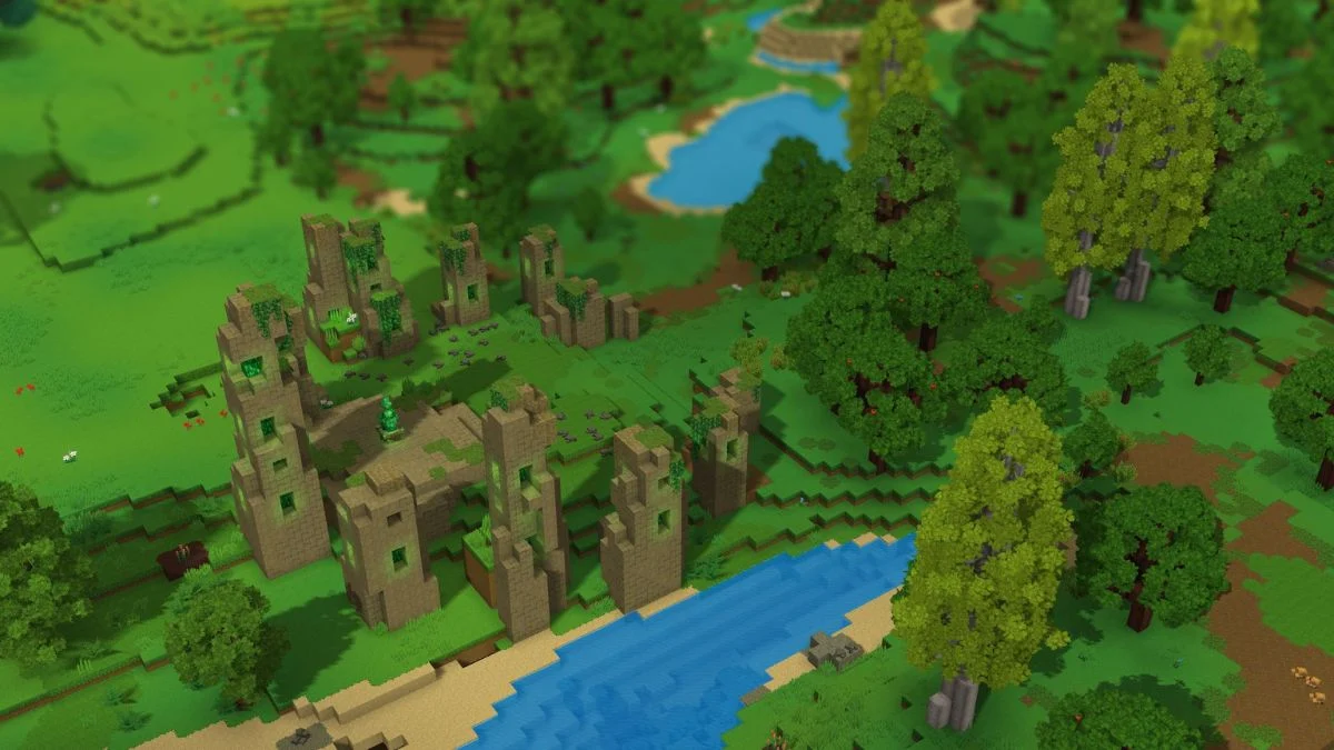 An overhead view of ancient stone ruins near a river in Hytale's green forest biome.