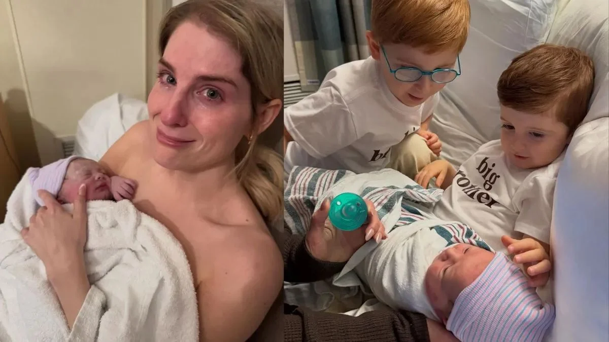 Meghan Trainor crying tears of joy while holding newborn baby Mikey Moon next to her two sons.