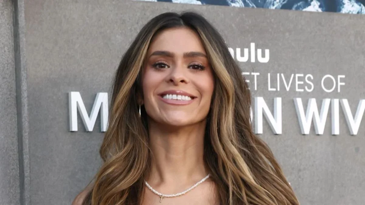 Taylor Frankie Paul smiling on the red carpet at a Hulu event for The Secret Lives of Mormon Wives.