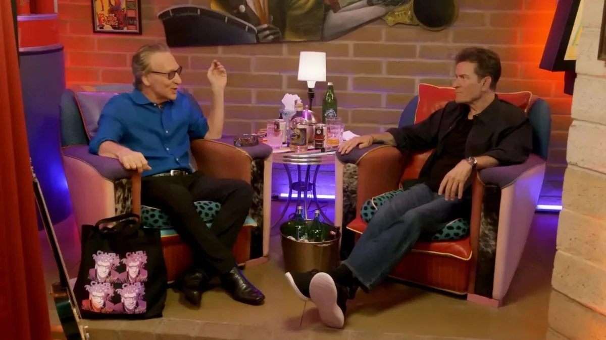 Charlie Sheen and Bill Maher discussing the NFL halftime show on the Club Random podcast.