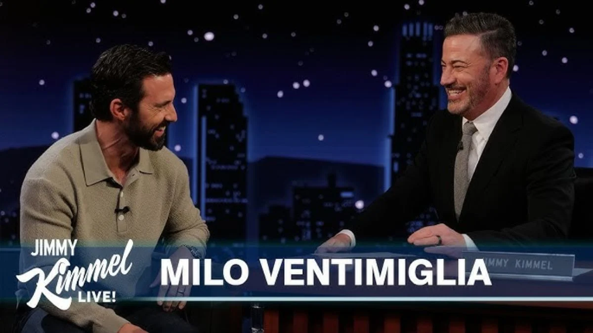 Milo Ventimiglia sitting across from Jimmy Kimmel during his late-night interview on ABC.
