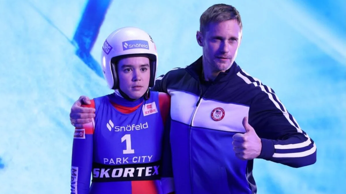 Actor Alexander Skarsgård in a sports jacket alongside a luge athlete in an SNL Olympic sketch.