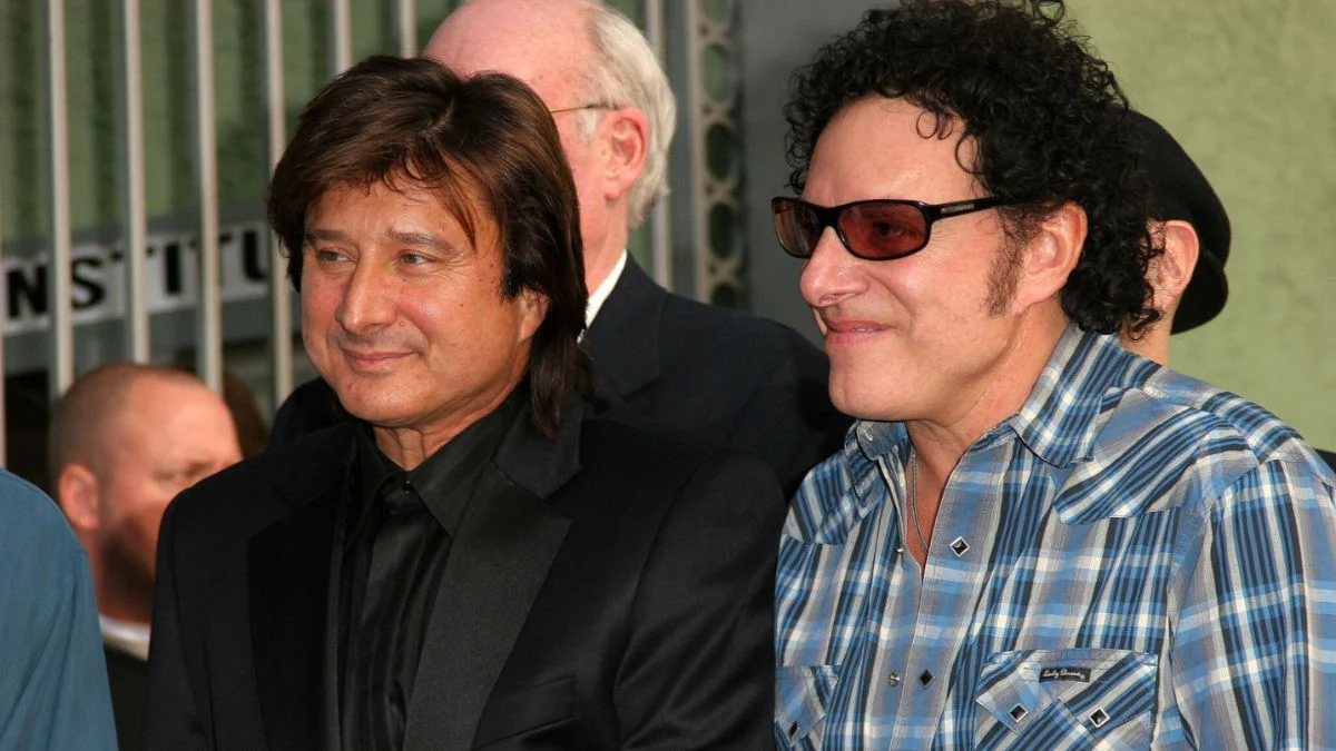 Steve Perry and Neal Schon of Journey appearing together at a public event.