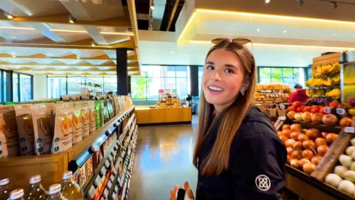 Kai Trump smiling inside an Erewhon Market grocery store during her controversial $233 shopping vlog.