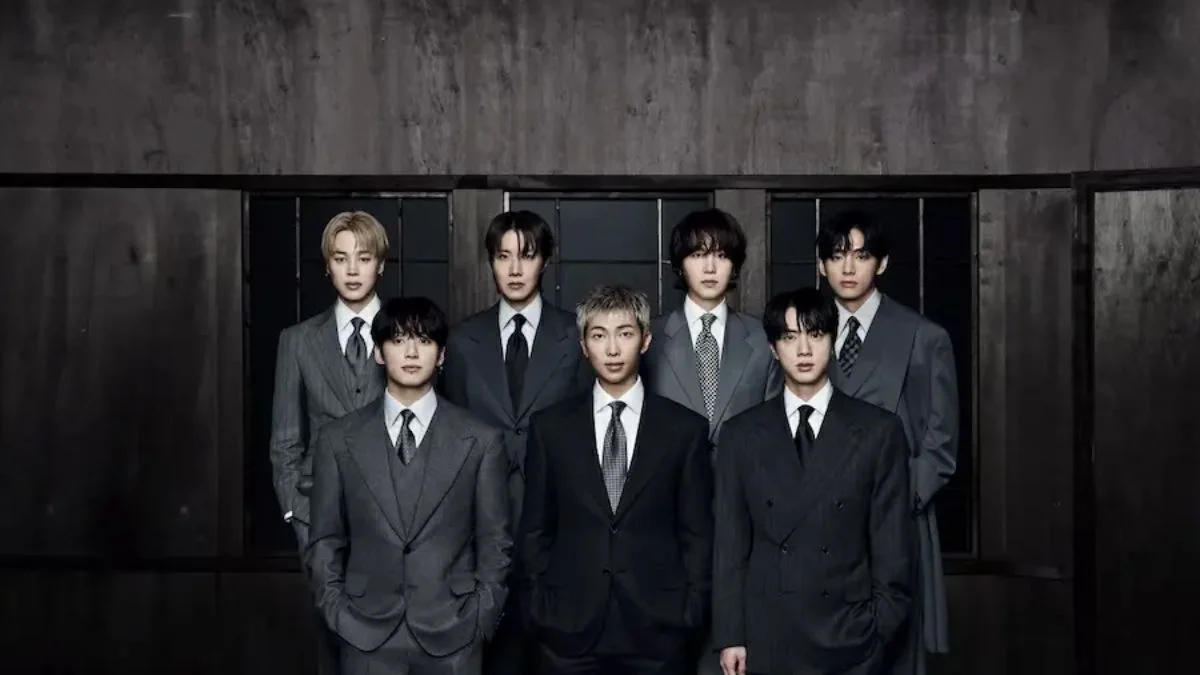 BTS members RM, Jin, SUGA, j-hope, Jimin, V, and Jung Kook posing in a rustic recording studio for the ARIRANG album concept photos.