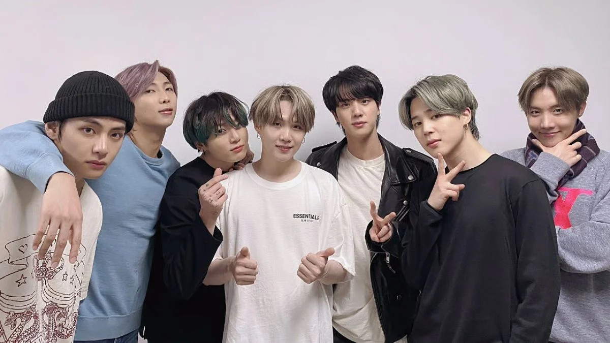 All seven members of BTS posing together for their 2026 ARIRANG comeback amid new South Korean anti-scalping laws.