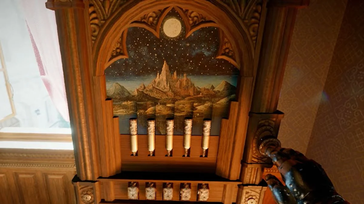 A close-up of the player's hand interacting with the lever on the right side of the Hillside Manor strongbox puzzle.