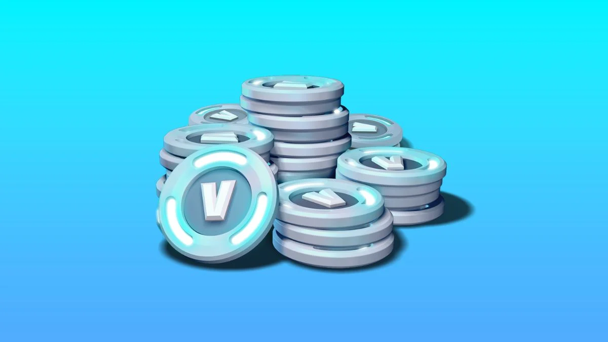 A stack of blue and silver Fortnite V-Bucks coins on a light blue background representing the March 2026 price changes.