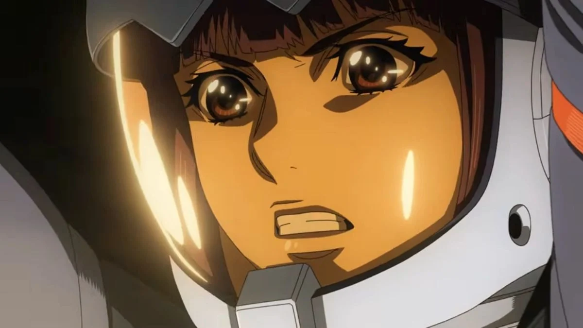 Close-up of Yuki Mori in a space helmet with a determined expression from Star Blazers Space Battleship Yamato 3199 Chapter 6.