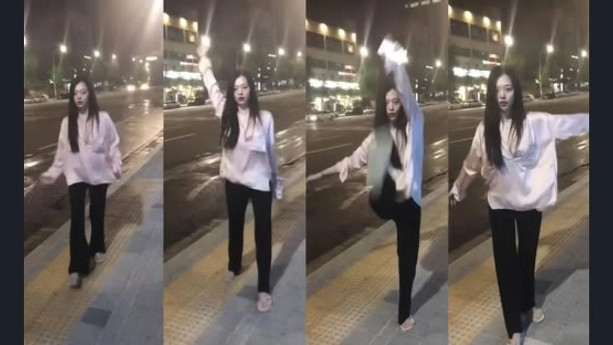 Four stills from a previously unreleased video of Sulli playing on a sidewalk in a pink silk top and black pants.