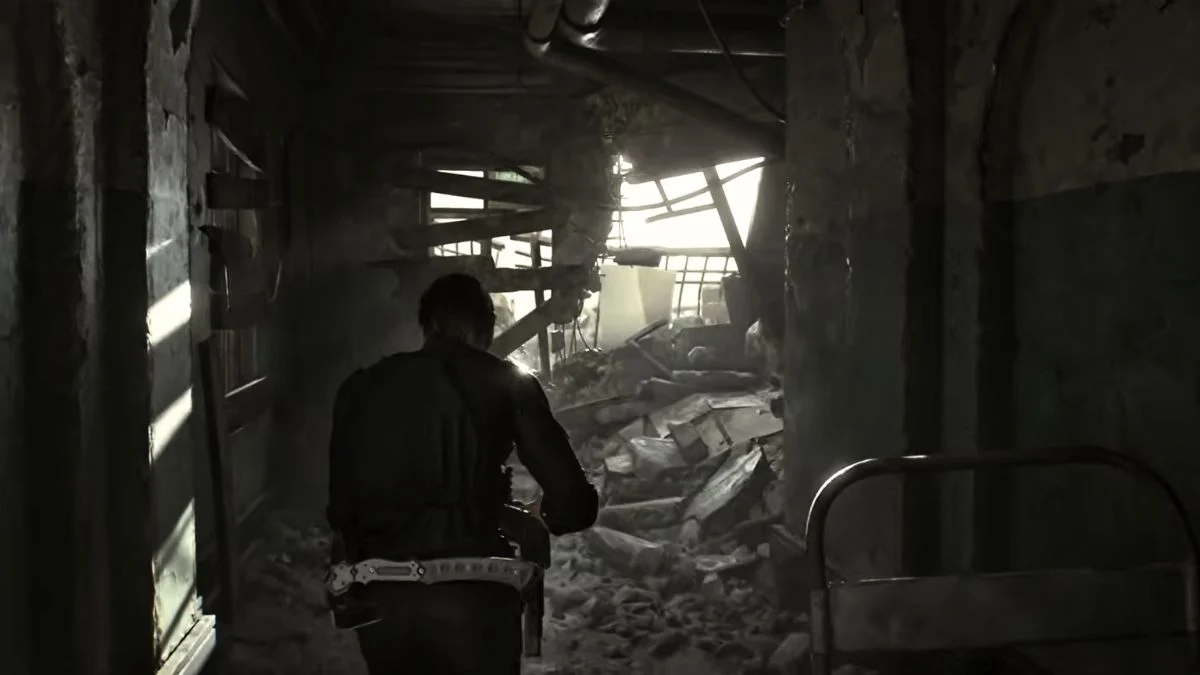 Leon Kennedy walking through the dark, ruined hallways of the RPD toward a Tofu sighting location.