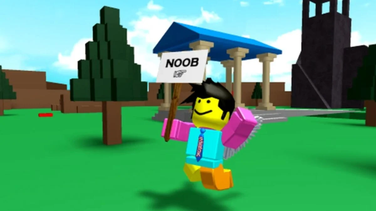 A Roblox avatar holding a "NOOB" sign in a vibrant green field environment with classic blocky architecture.