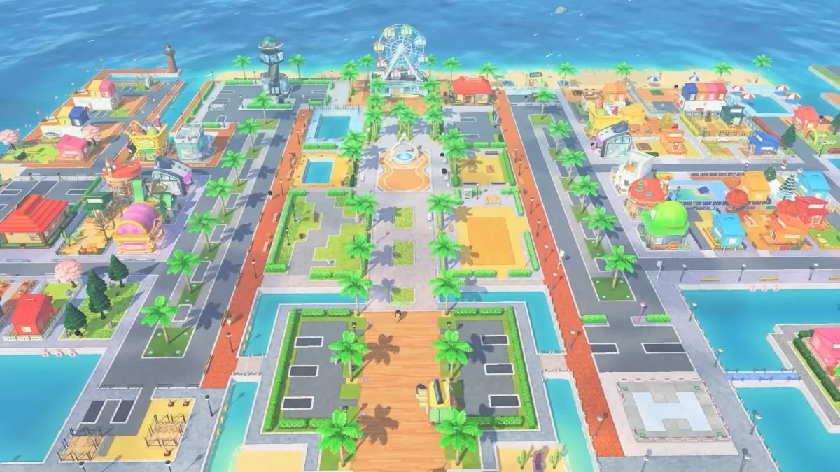 An aerial view of the island in Tomodachi Life: Living the Dream for Nintendo Switch, showing various shops, the Ferris wheel, and the beach.
