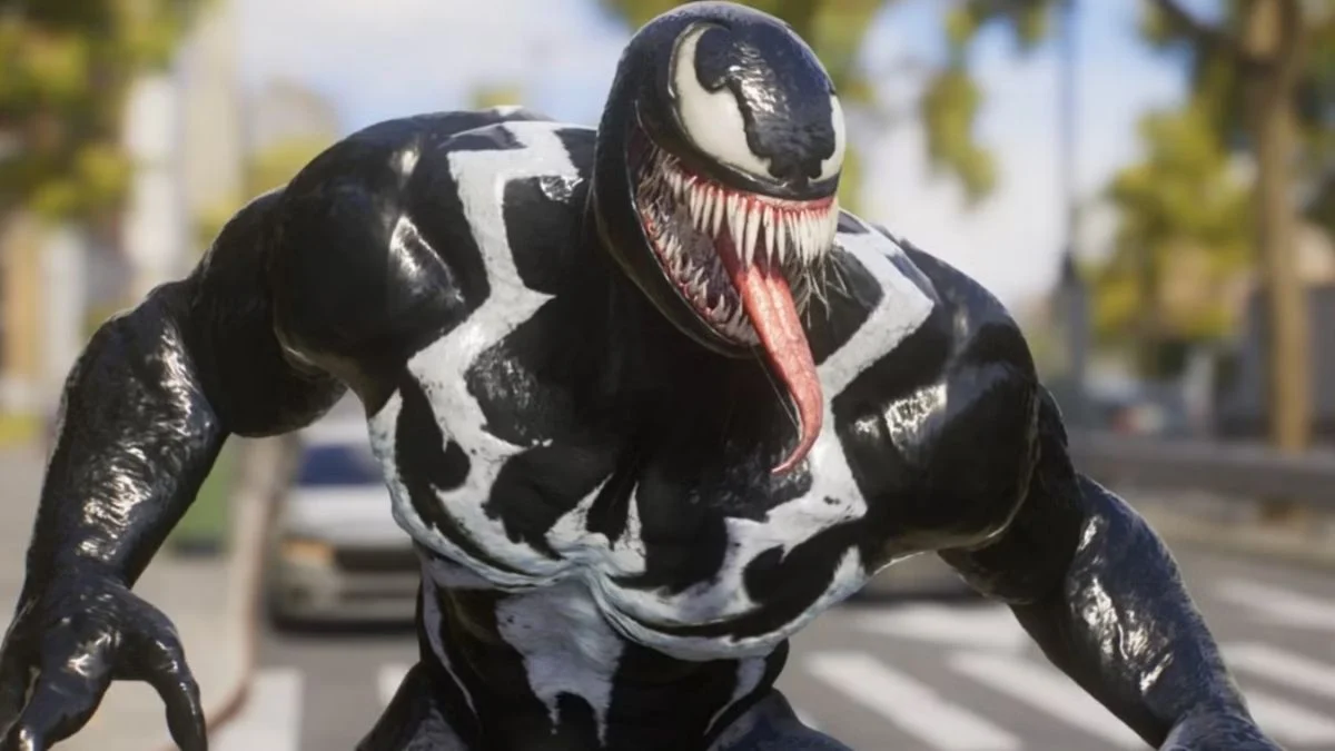 A cinematic shot of Venom from Marvel's Spider-Man 2, referencing the rumors of a standalone spin-off game.