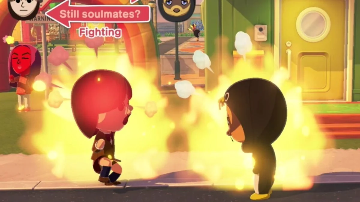 Two Miis in Tomodachi Life: Living the Dream on fire and blowing steam during an intense fight on the street.