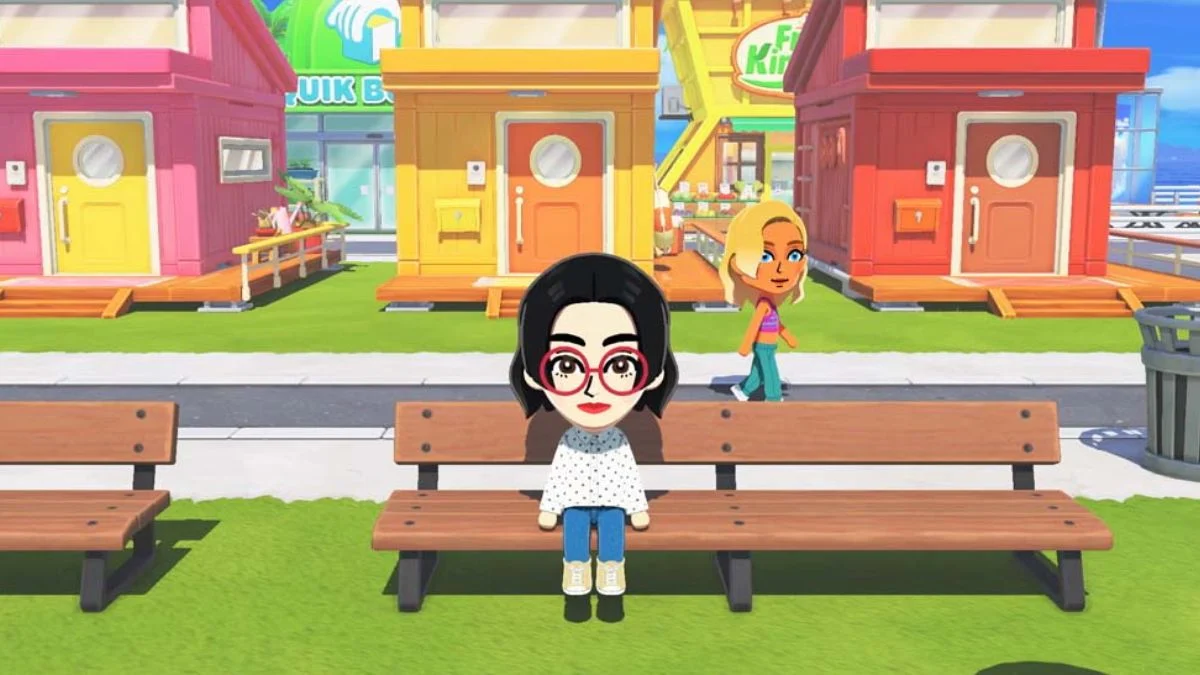 A Mii character with black hair and red glasses sitting on a wooden park bench in Tomodachi Life: Living the Dream.