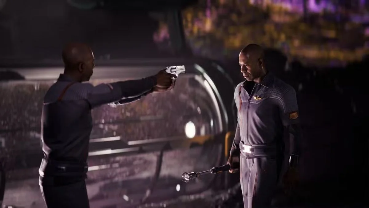 Two crew members in grey futuristic uniforms face off, with one pointing a pistol at the other aboard a spaceship in Directive 8020.