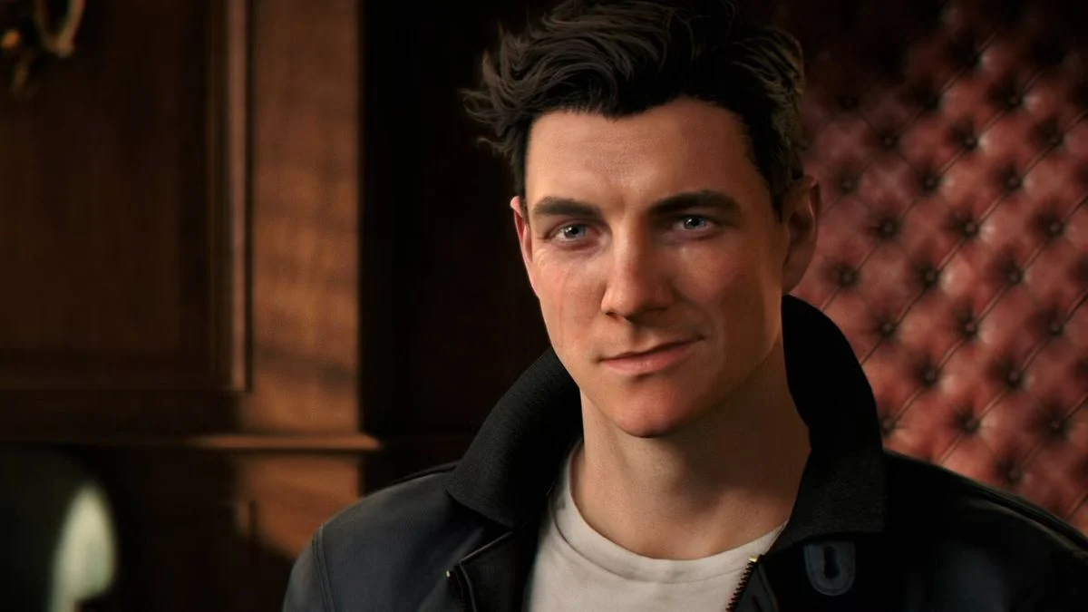 007 First Light screenshot showing the young James Bond portrayed by Patrick Gibson smirking in a leather jacket.