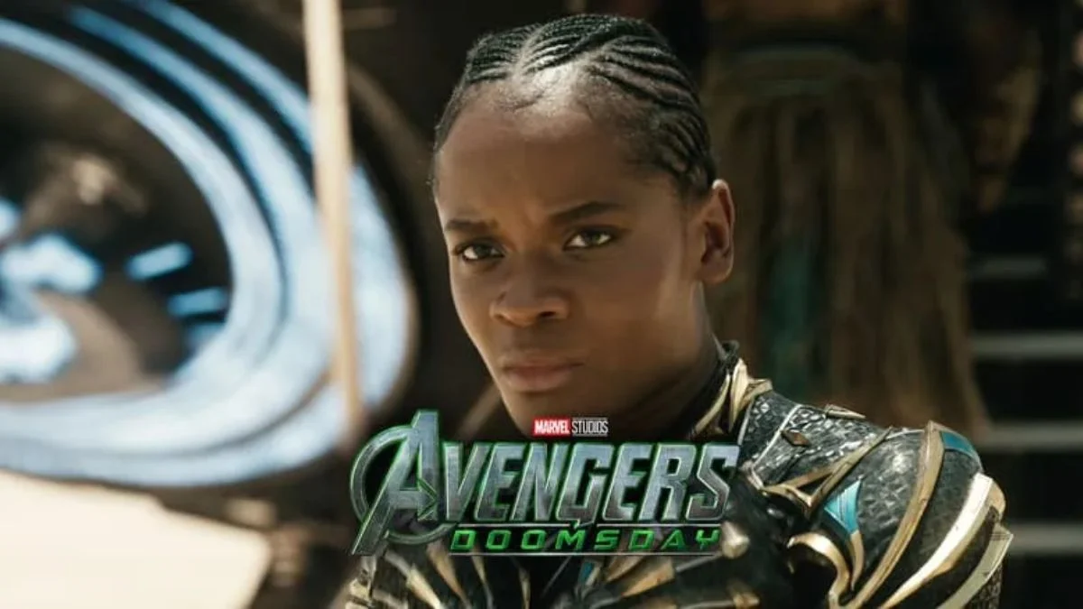 Close-up shot of Letitia Wright as Shuri in her Black Panther armor from Avengers Doomsday with the movie logo overlaid at the bottom.