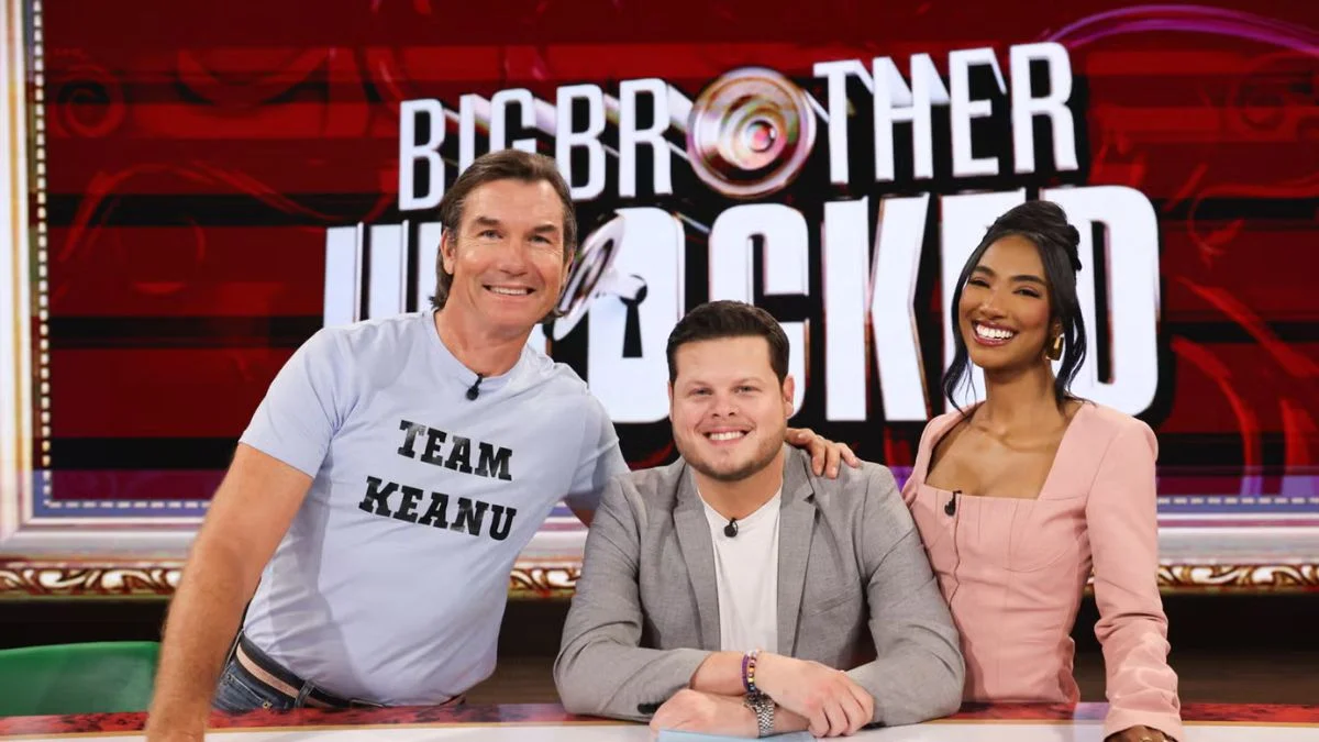 Jerry O'Connell wearing a Team Keanu shirt, Derrick Levasseur, and Taylor Hale smiling together on the Big Brother Unlocked studio set.