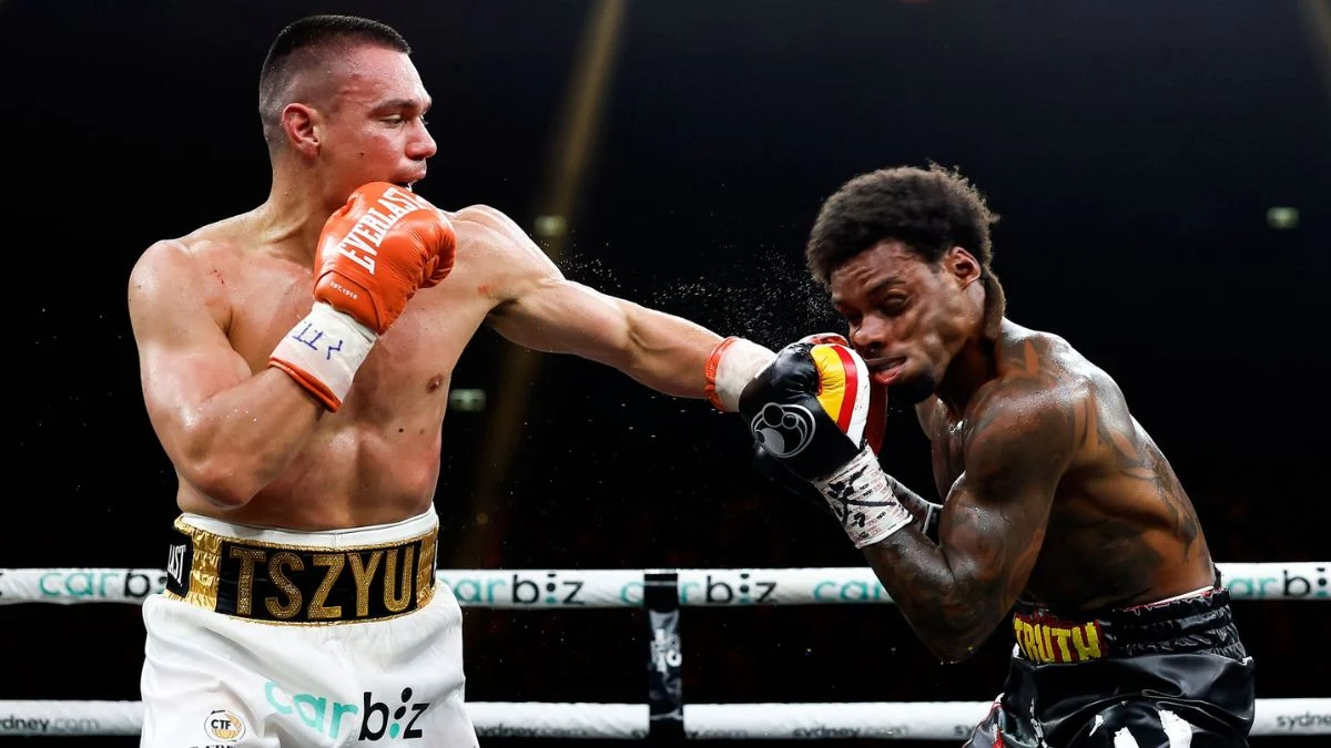Tim Tszyu landing a powerful straight right hand punch to the face of Errol Spence Jr. during their middleweight boxing match at Afterpay Arena.