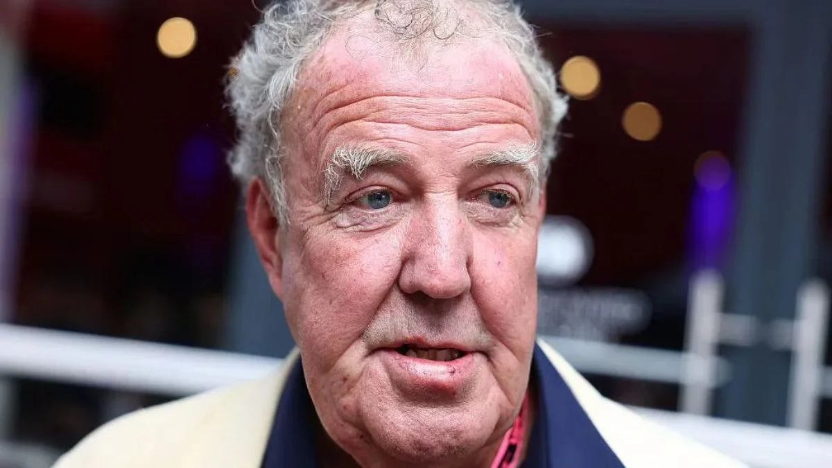 A close-up portrait shot of Jeremy Clarkson, an older man with grey hair and blue eyes, looking slightly to the right of the camera.