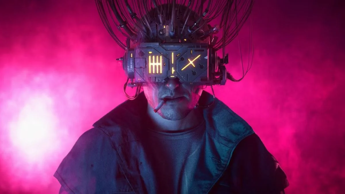 A cyberpunk console cowboy wearing a massive virtual reality head deck with wires running up, smoking a cigarette against a neon pink smoky background.