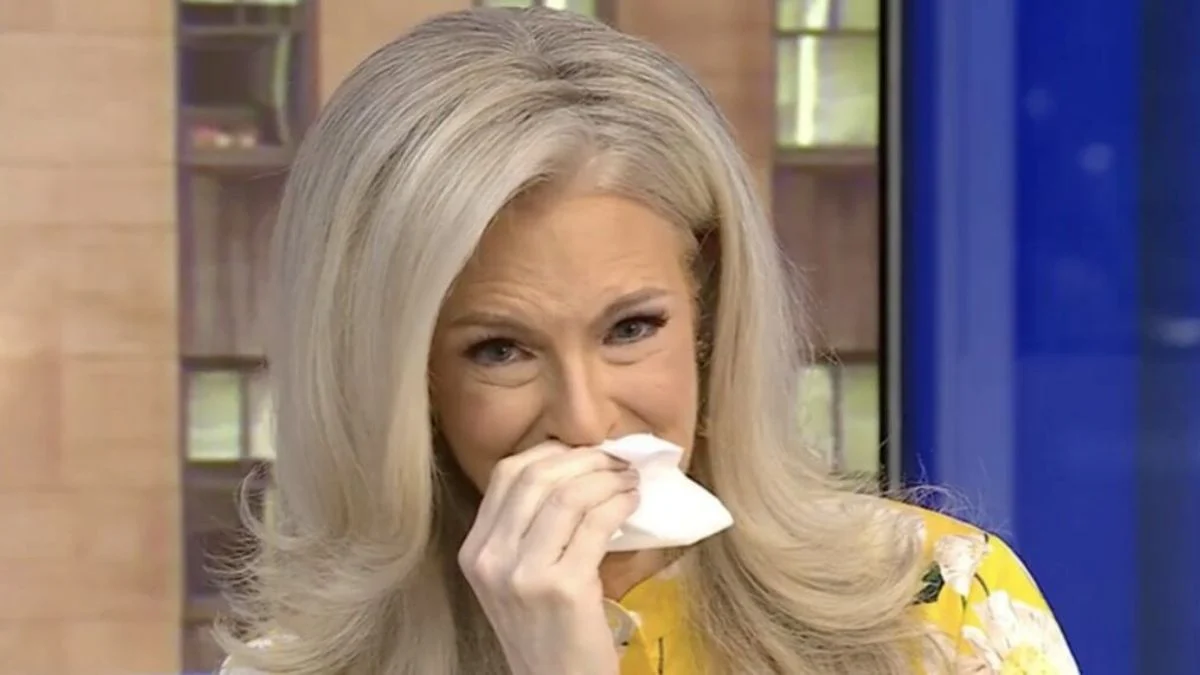 Fox News senior meteorologist Janice Dean wiping tears with a tissue during her final on-air broadcast.