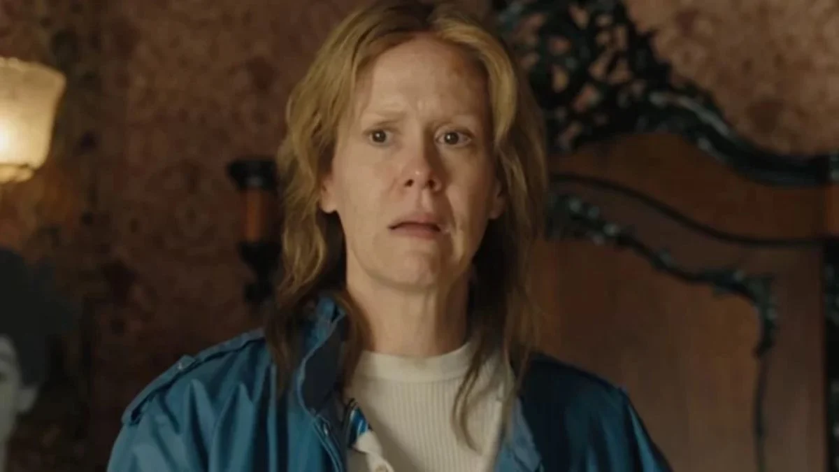 Sarah Paulson with light straggly hair and a distressed expression in a scene from Monster: The Lizzie Borden Story.