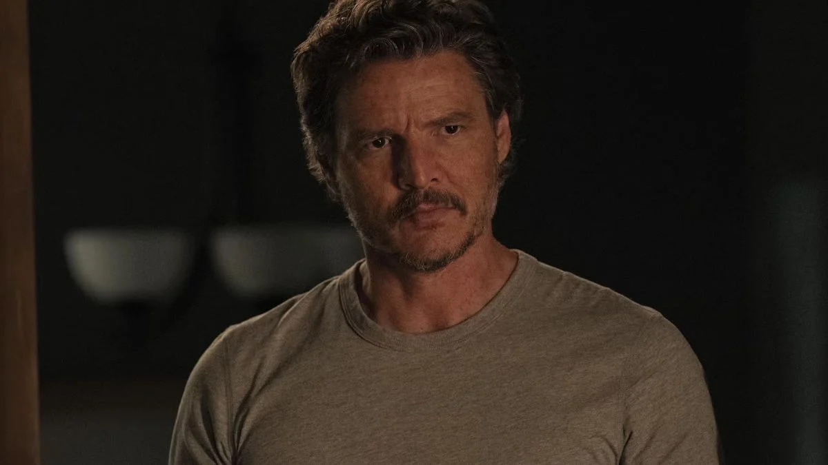 Pedro Pascal as Joel Miller looking intense in a scene from HBO's The Last of Us.