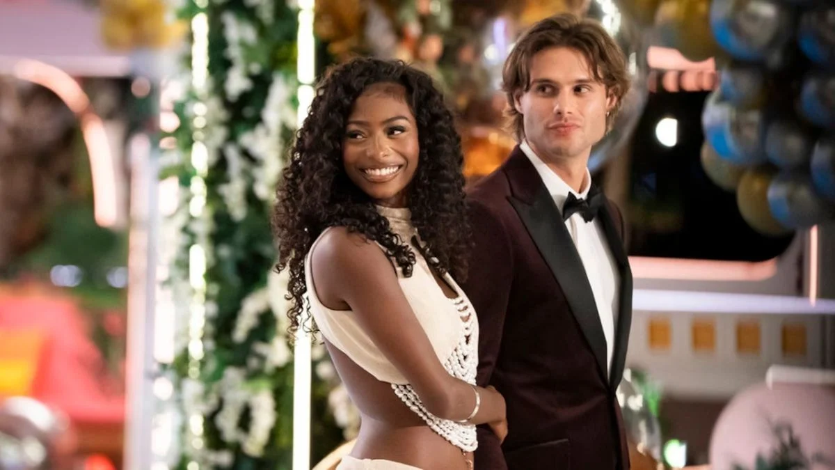 Love Island USA Season 8 winning couple Trinity Tatum and Bryce Dettloff smiling together during a formal event