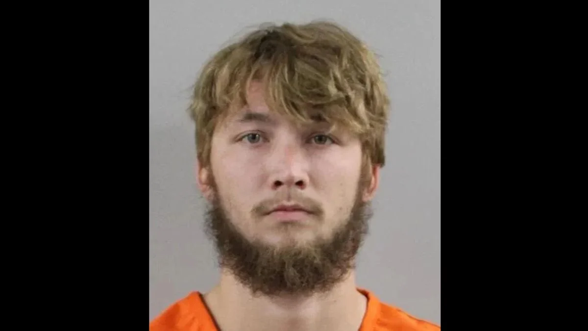 Polk County Sheriff's Office mugshot of 22-year-old Shane Clemens in an orange jail jumpsuit.