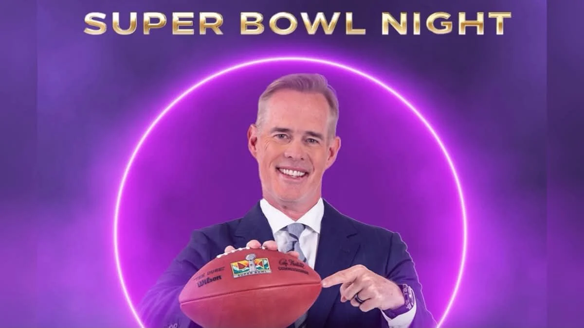 Joe Buck holding a football in front of a purple ring light for DWTS Super Bowl Night.