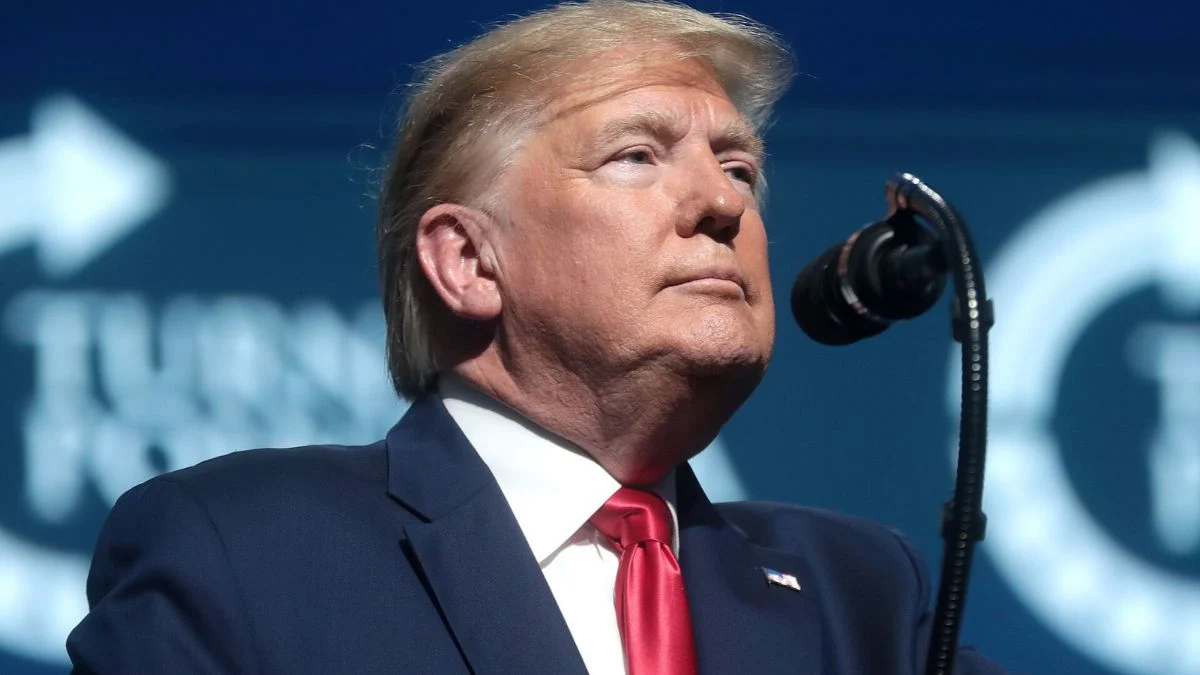 Donald Trump speaking at a podium during a public event