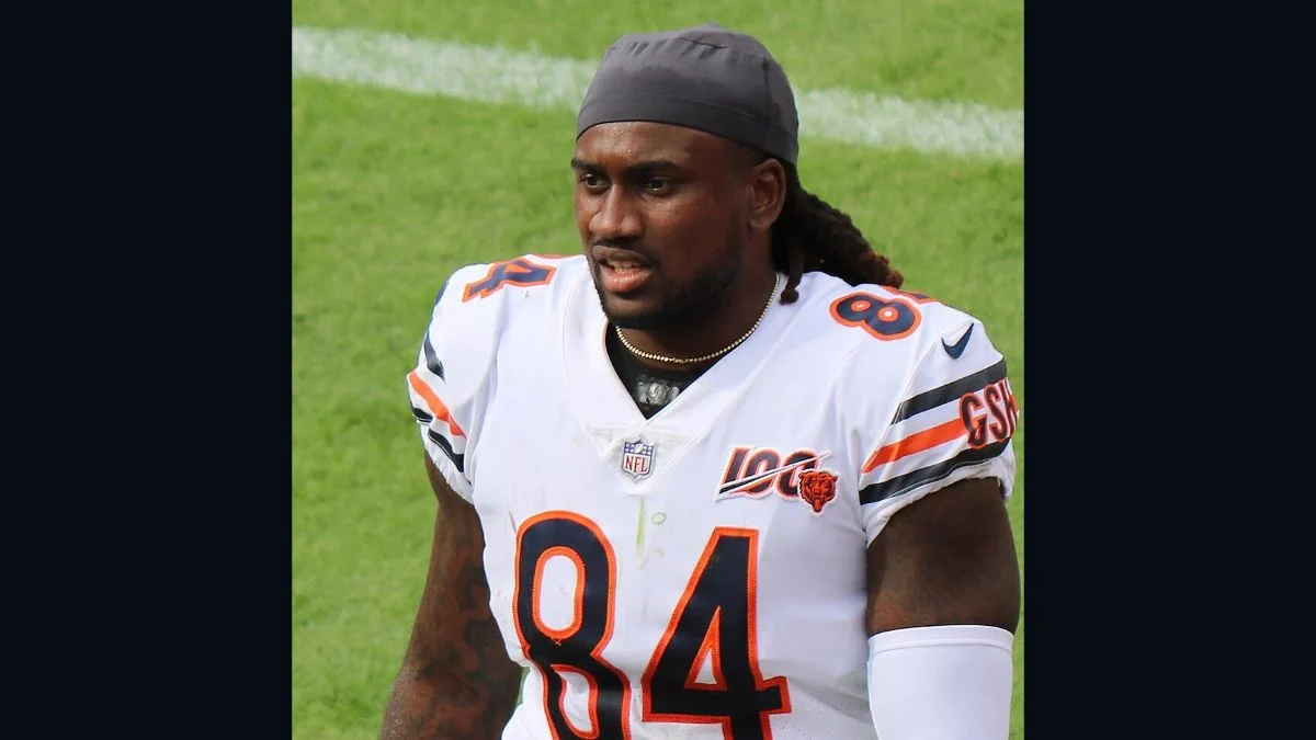 Cordarrelle Patterson wearing a Chicago Bears jersey and grey cap on the football field.