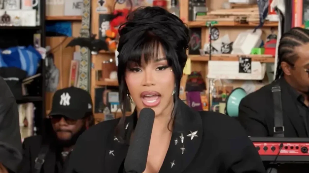 Cardi B performing with a microphone during her NPR Tiny Desk Concert