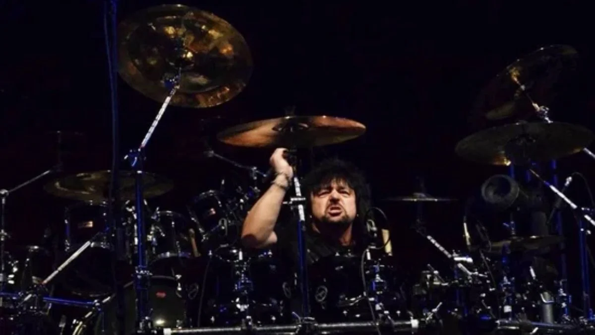 Former Saxon and Oliver/Dawson Saxon drummer Nigel Durham playing a drum kit live on stage