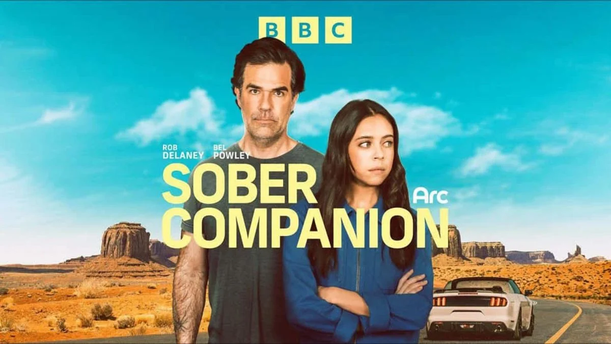 Rob Delaney and Bel Powley standing in front of a desert backdrop with a white convertible car for the BBC audio series Sober Companion.