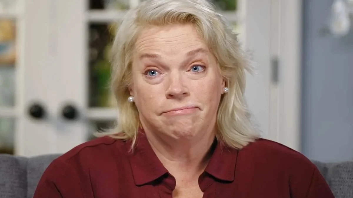 Janelle Brown sitting during a couch interview segment on Sister Wives Season 21